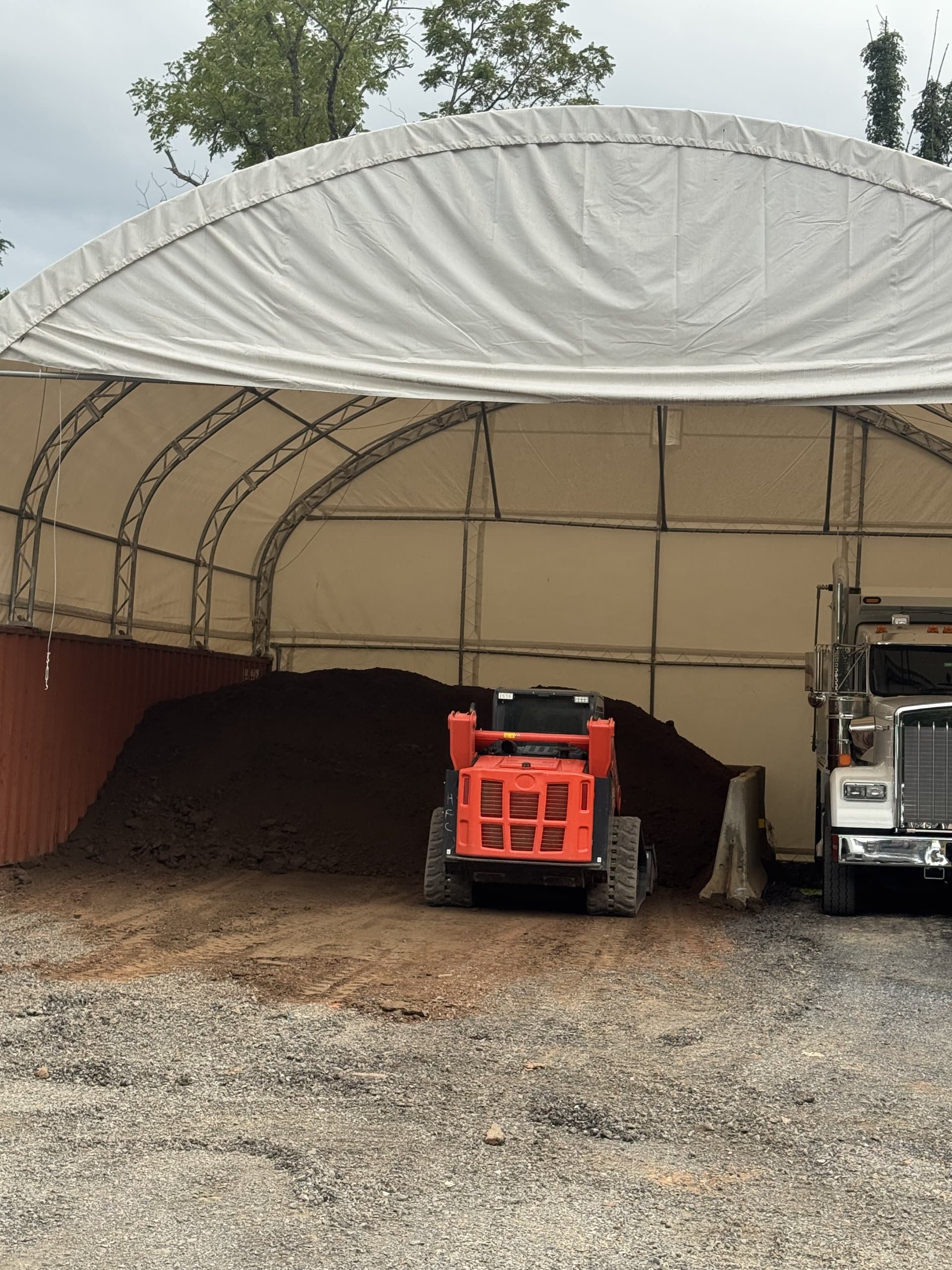 EW Wise topsoil storage bays under the covered shed
